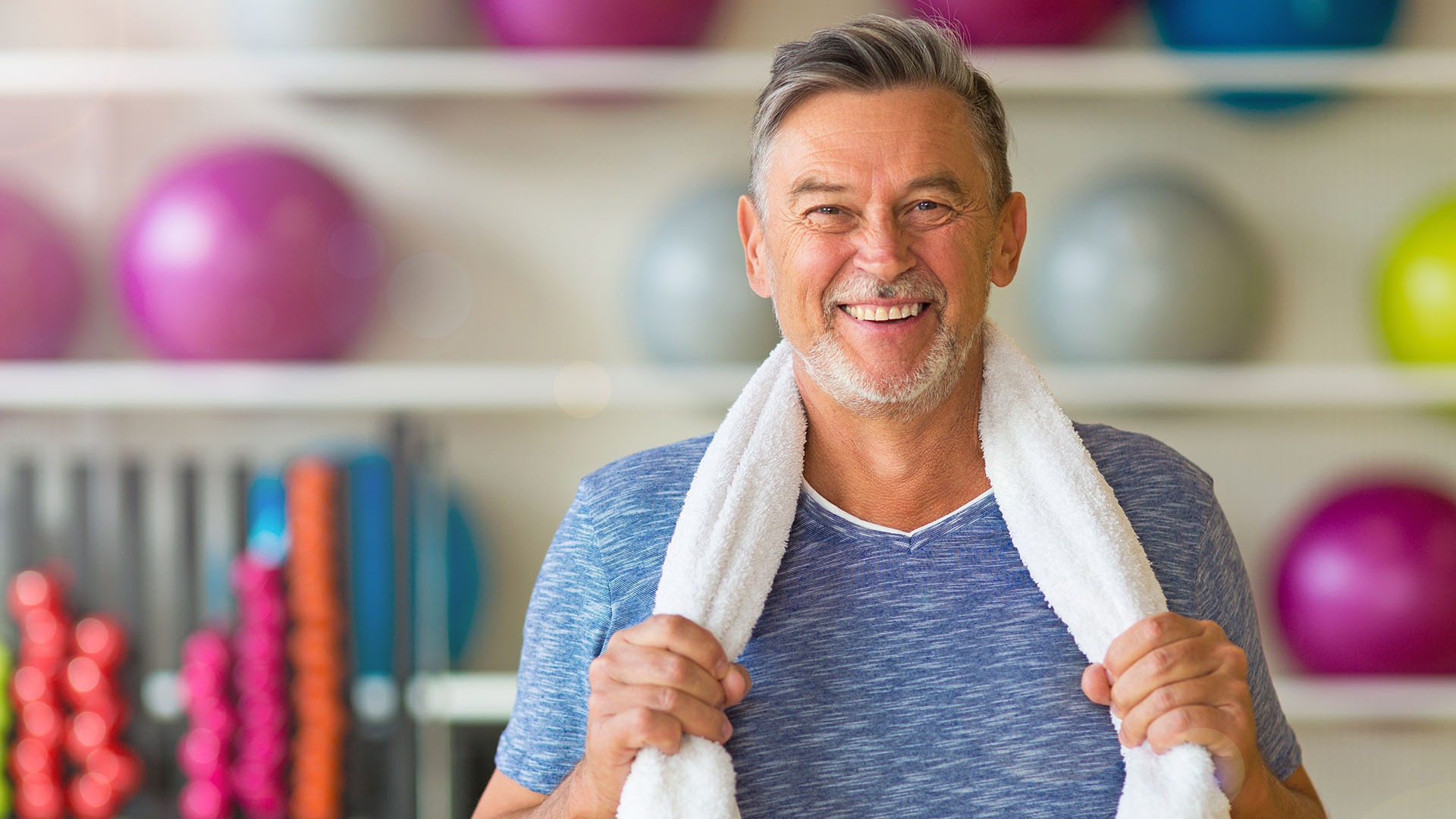 Senior man in health club