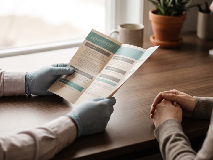 A physician reviewing lab results with a patient
