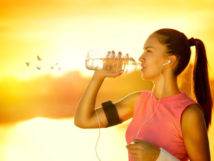 Active woman at sunset
